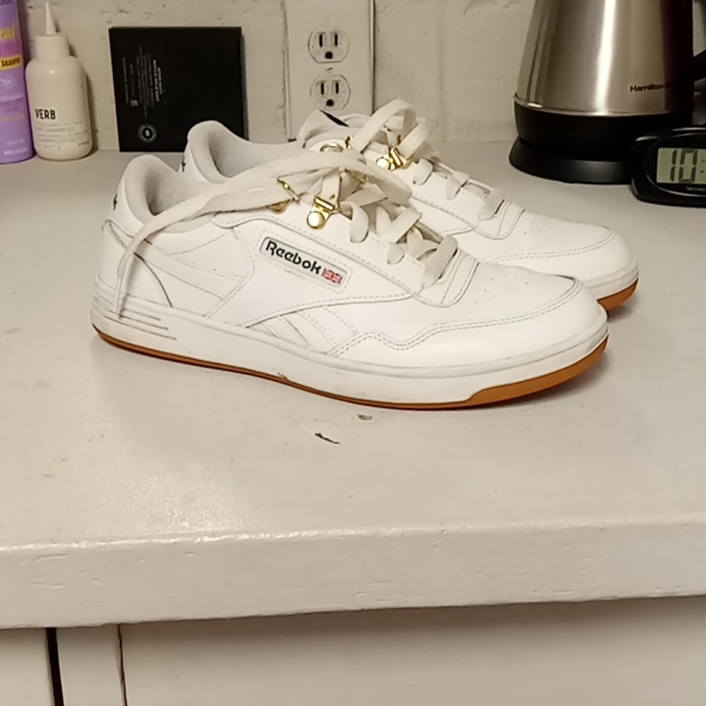 White and forest green Reeboks